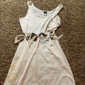 Baby phat dress. Never worn . White and gold. Size M
